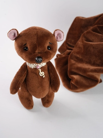 Коричневый мишка